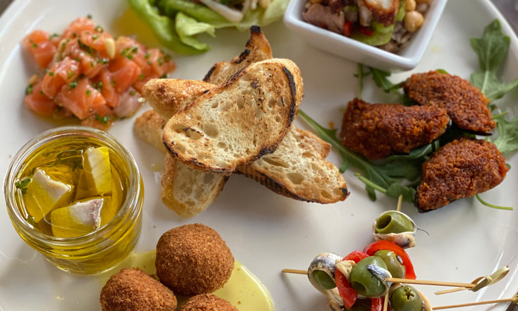 At Cucina Enoteca, the Feast of the Seven Fishes is a tapas-style platter for sharing.